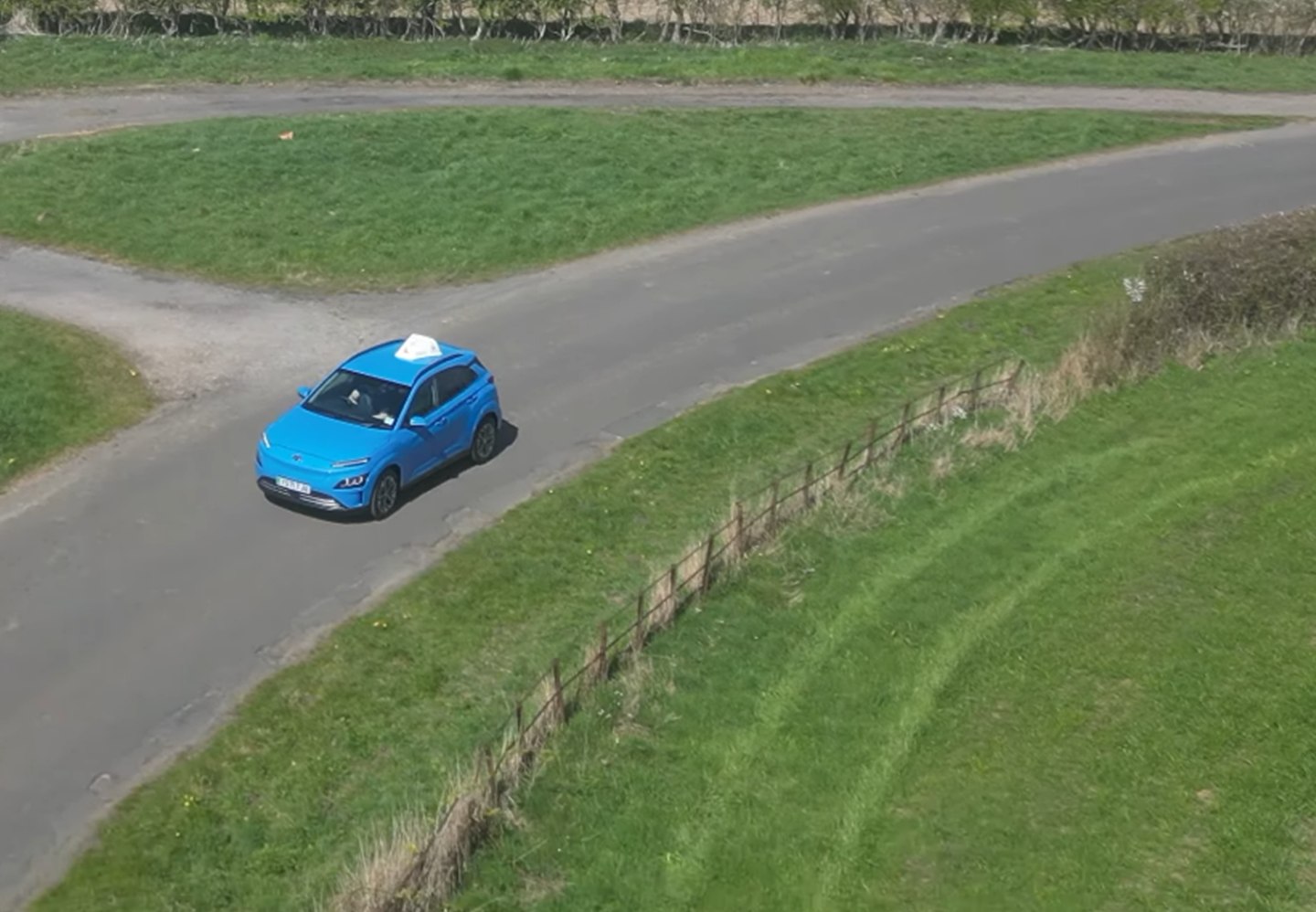 Dean's blue Hyundai tuition car on a local road